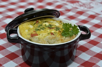 Een quiche bereidt in een cocotte